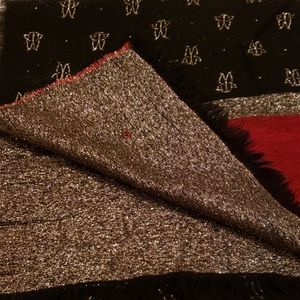 Scarf,  sparkly red,  gold and black. Very pretty